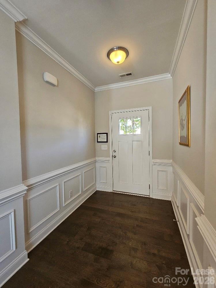 990 Pennington Drive Lancaster, SC 29720 - Photo 4 of 4 a view of an empty room with wooden floor and windows