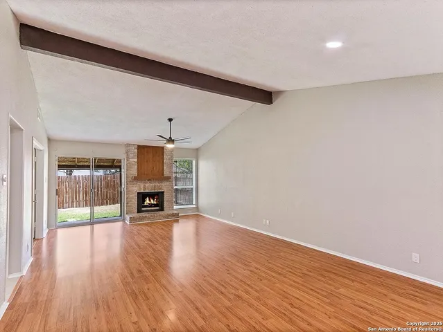 a view of a livingroom with a furniture and fireplace