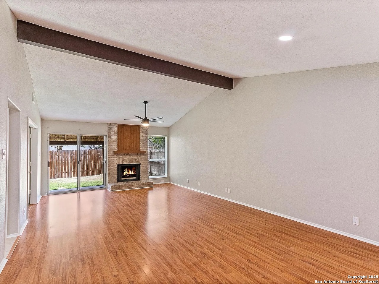 717 Meadow Gate Converse, TX 78109 - Photo 11 of 34 a view of a livingroom with a furniture and fireplace