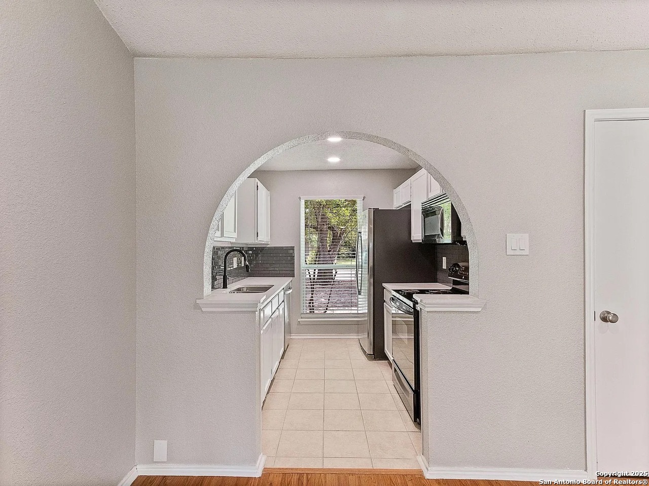 717 Meadow Gate Converse, TX 78109 - Photo 16 of 34 a view of a kitchen with a sink