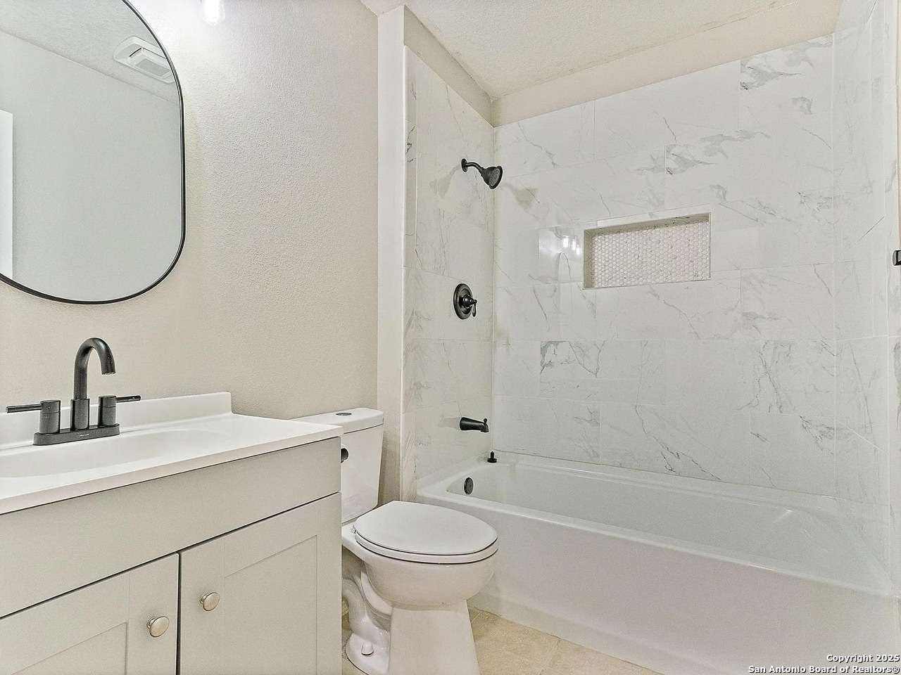 717 Meadow Gate Converse, TX 78109 - Photo 23 of 34 a bathroom with a sink a toilet and shower