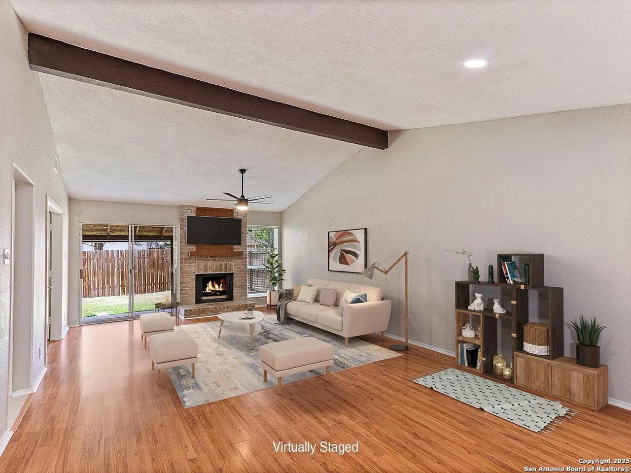 717 Meadow Gate Converse, TX 78109 - Photo 7 of 34 a living room with furniture and fireplace