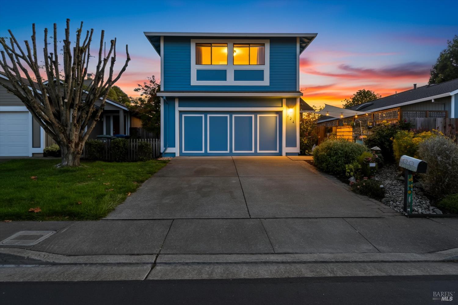 101 Pinewood Court Cotati, CA 94931 - Photo 1 of 21 a front view of a house with a yard and garage