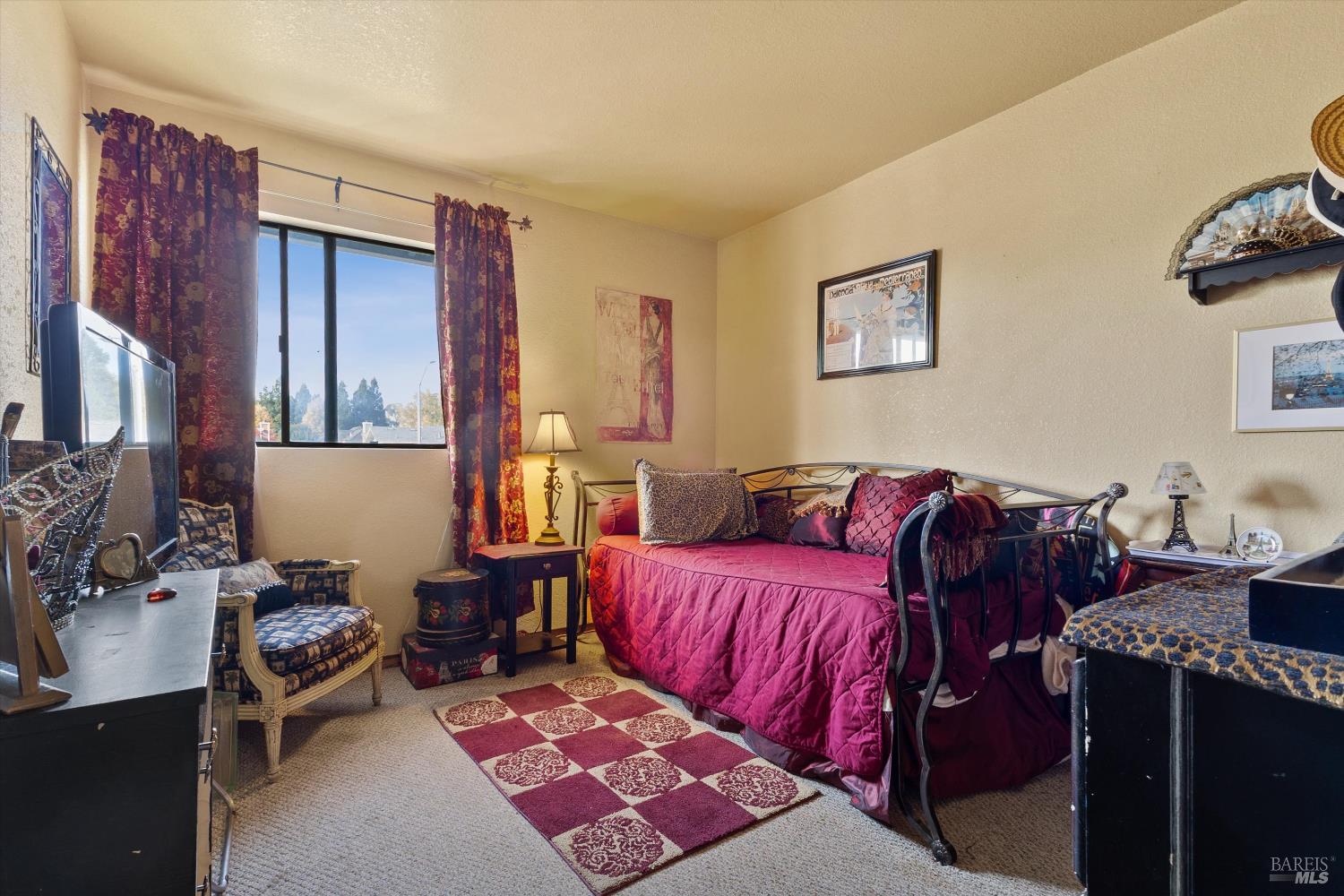 101 Pinewood Court Cotati, CA 94931 - Photo 16 of 21 a bedroom with furniture and a mirror