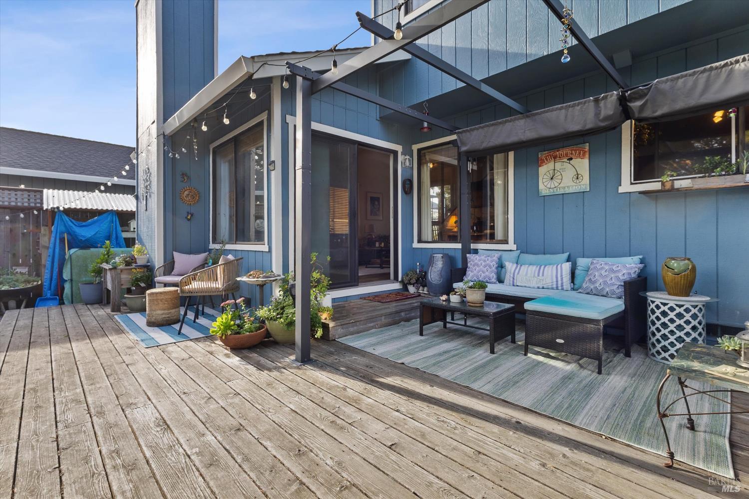 101 Pinewood Court Cotati, CA 94931 - Photo 19 of 21 a patio with patio couch and wooden floor