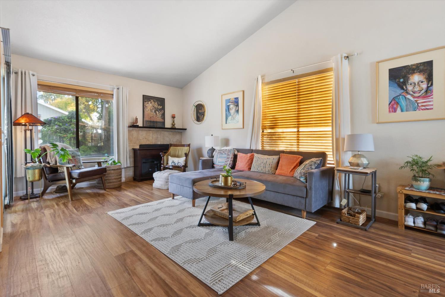 101 Pinewood Court Cotati, CA 94931 - Photo 7 of 21 a living room with furniture and a fireplace