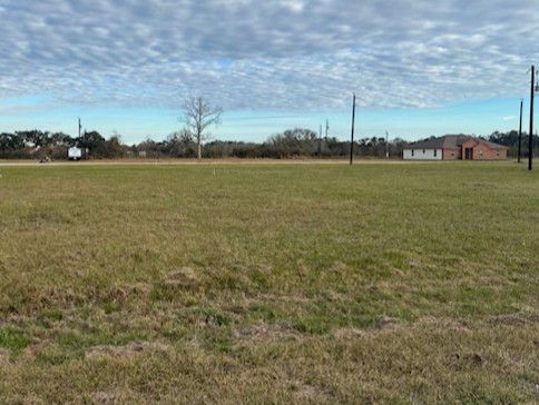Tbd Riverside Drive Palacios, TX 77465 - Photo 2 of 4 a view of a field with an ocean view