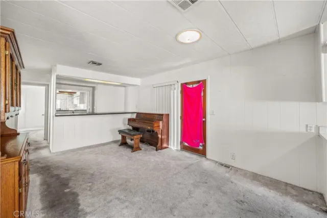 a view of a livingroom with furniture