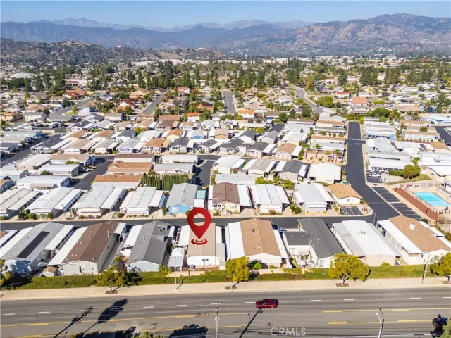 an aerial view of a house with a ocean view