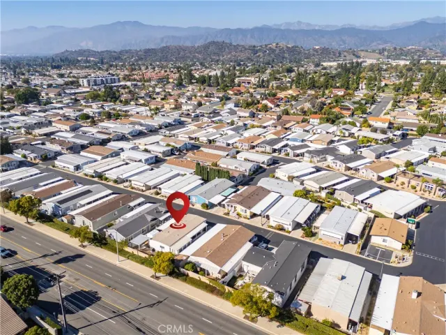 an aerial view of a house with a ocean view