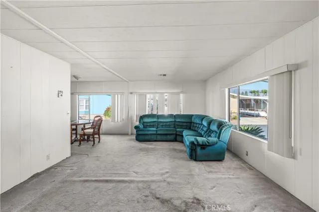 a room with furniture and a window