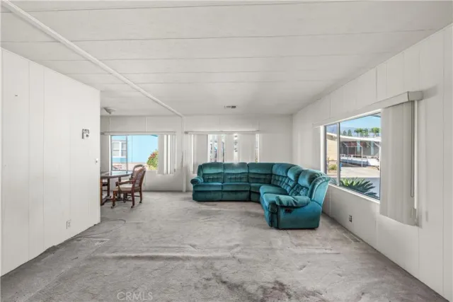 a room with furniture and a window