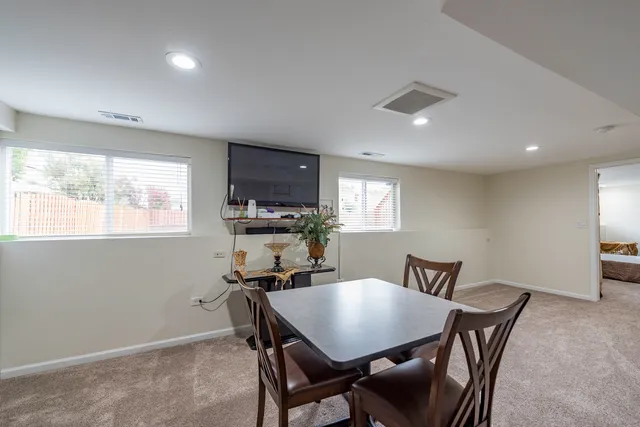 a view of a dining room with furniture