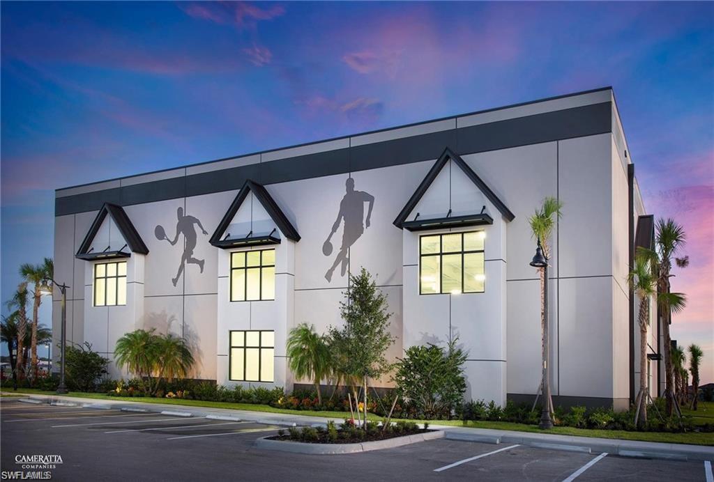 20015 Napa Loop Estero, FL 33928 - Photo 21 of 29 a front view of a house with a garden