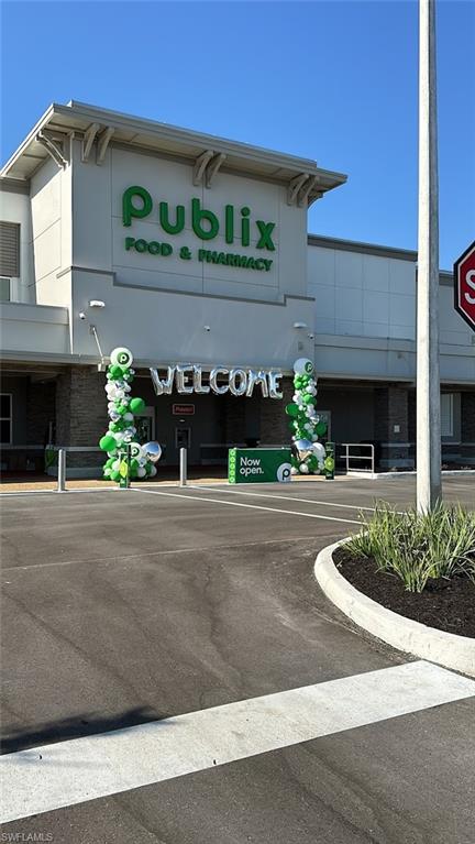 20015 Napa Loop Estero, FL 33928 - Photo 29 of 29 a front view of a house with a yard