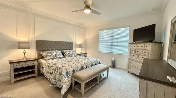 a bathroom with a sink a mirror and a shower