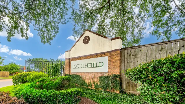 a sign on the side of the road