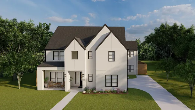 a view of a house with a yard