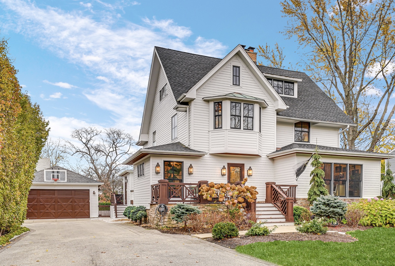 475 Cedar Street Winnetka, IL 60093 - Photo 1 of 46 a front view of a house with garden