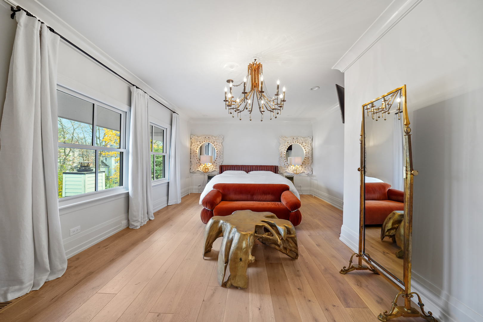 475 Cedar Street Winnetka, IL 60093 - Photo 19 of 46 a bedroom with a bed and wooden floor