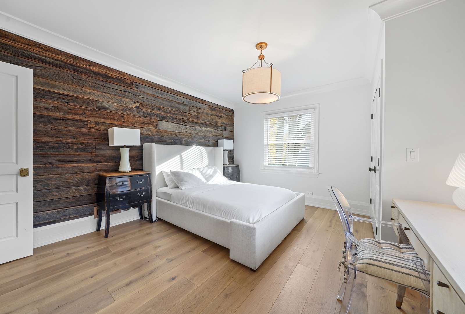 475 Cedar Street Winnetka, IL 60093 - Photo 27 of 46 a bedroom with a bed and wooden floor