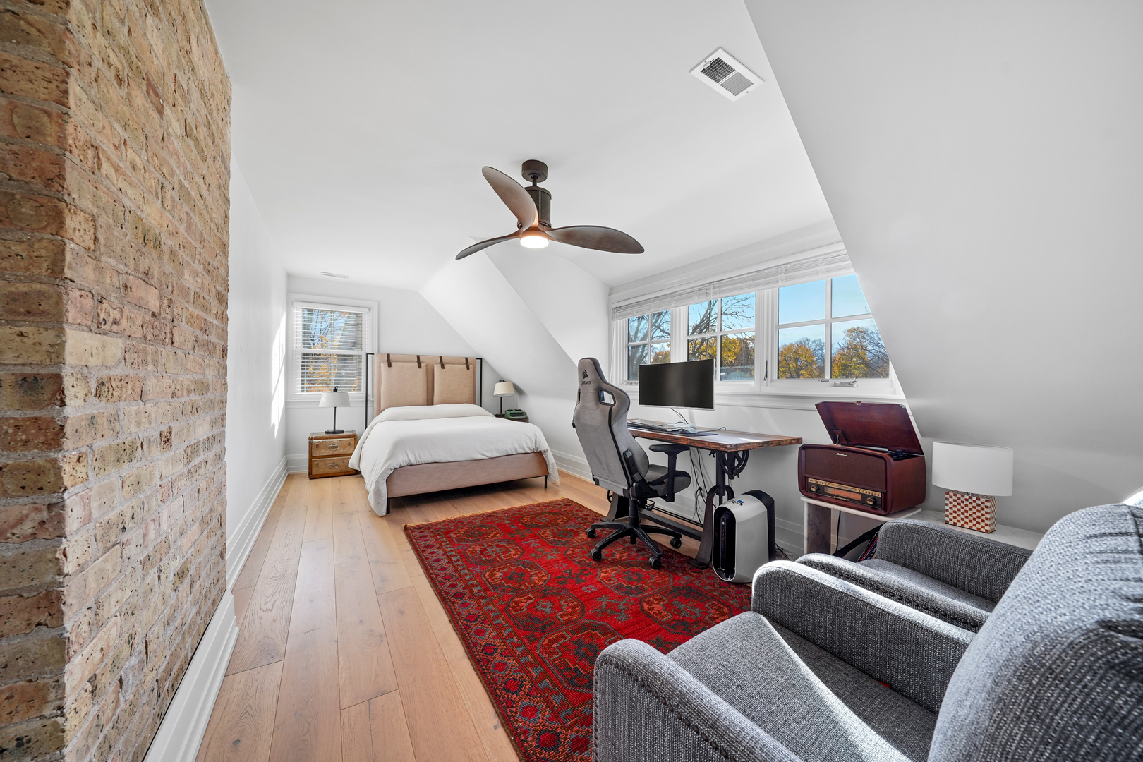 475 Cedar Street Winnetka, IL 60093 - Photo 32 of 46 a bedroom with furniture and a chandelier