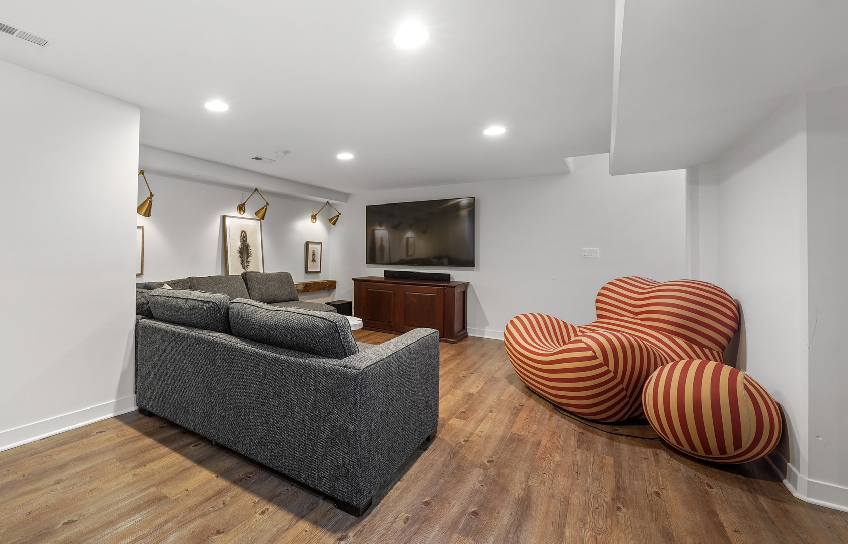 475 Cedar Street Winnetka, IL 60093 - Photo 34 of 46 a living room with furniture and a flat screen tv