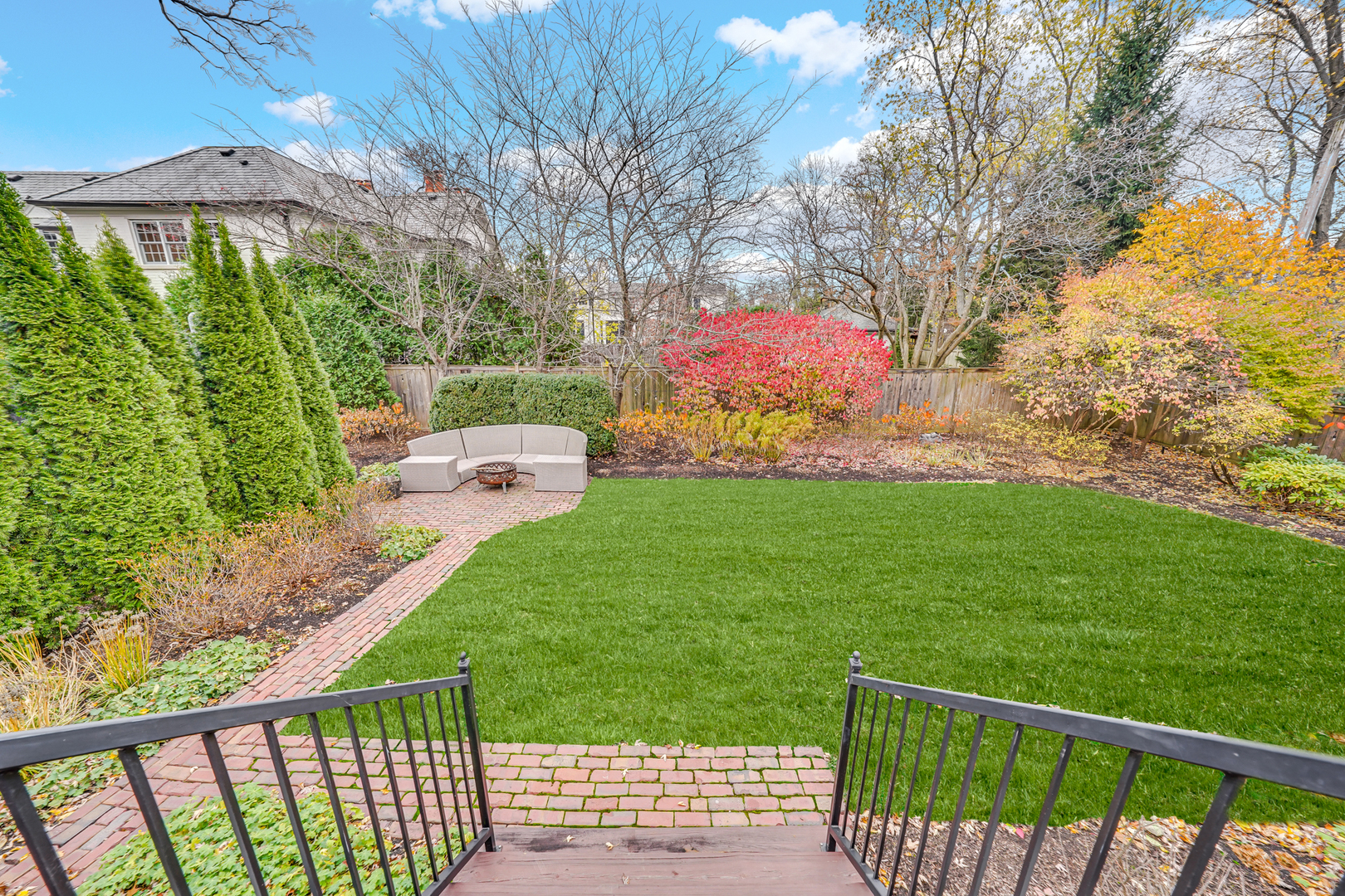 475 Cedar Street Winnetka, IL 60093 - Photo 40 of 46 a front view of a house having yard