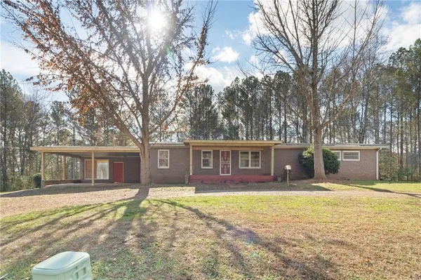 front view of a house with a yard