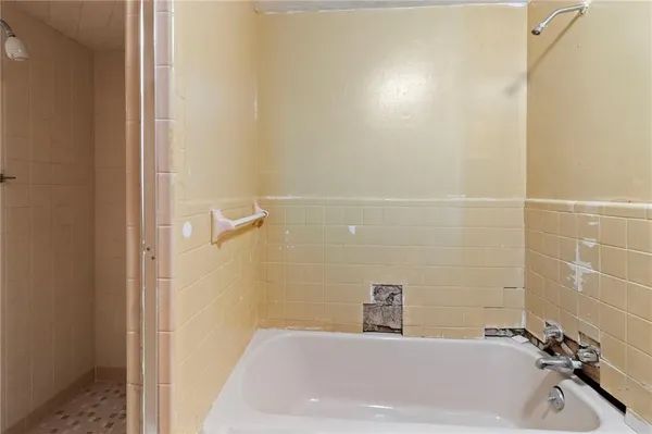 a bathroom with a bathtub