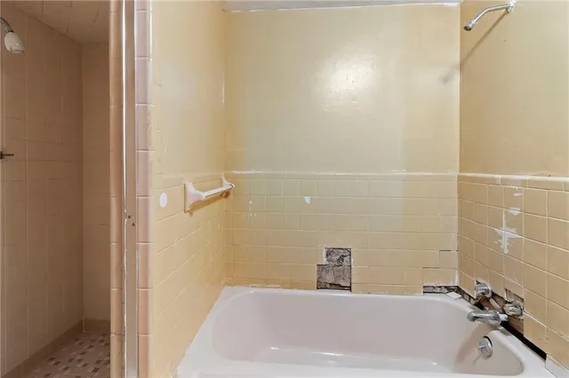 a bathroom with a bathtub