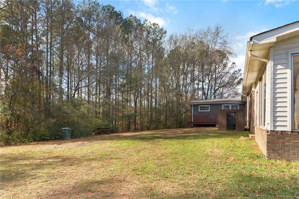 74 Hulsey Road Cedartown, GA 30125 - Photo 34 of 36 a swimming pool with trees in front of it