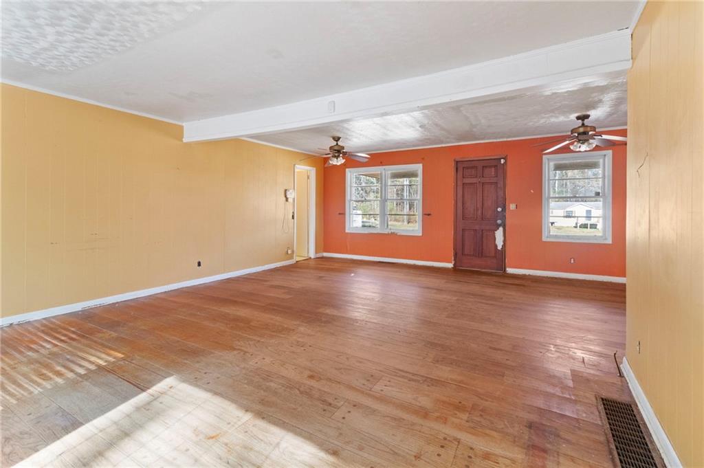 74 Hulsey Road Cedartown, GA 30125 - Photo 8 of 36 a view of an empty room with a window