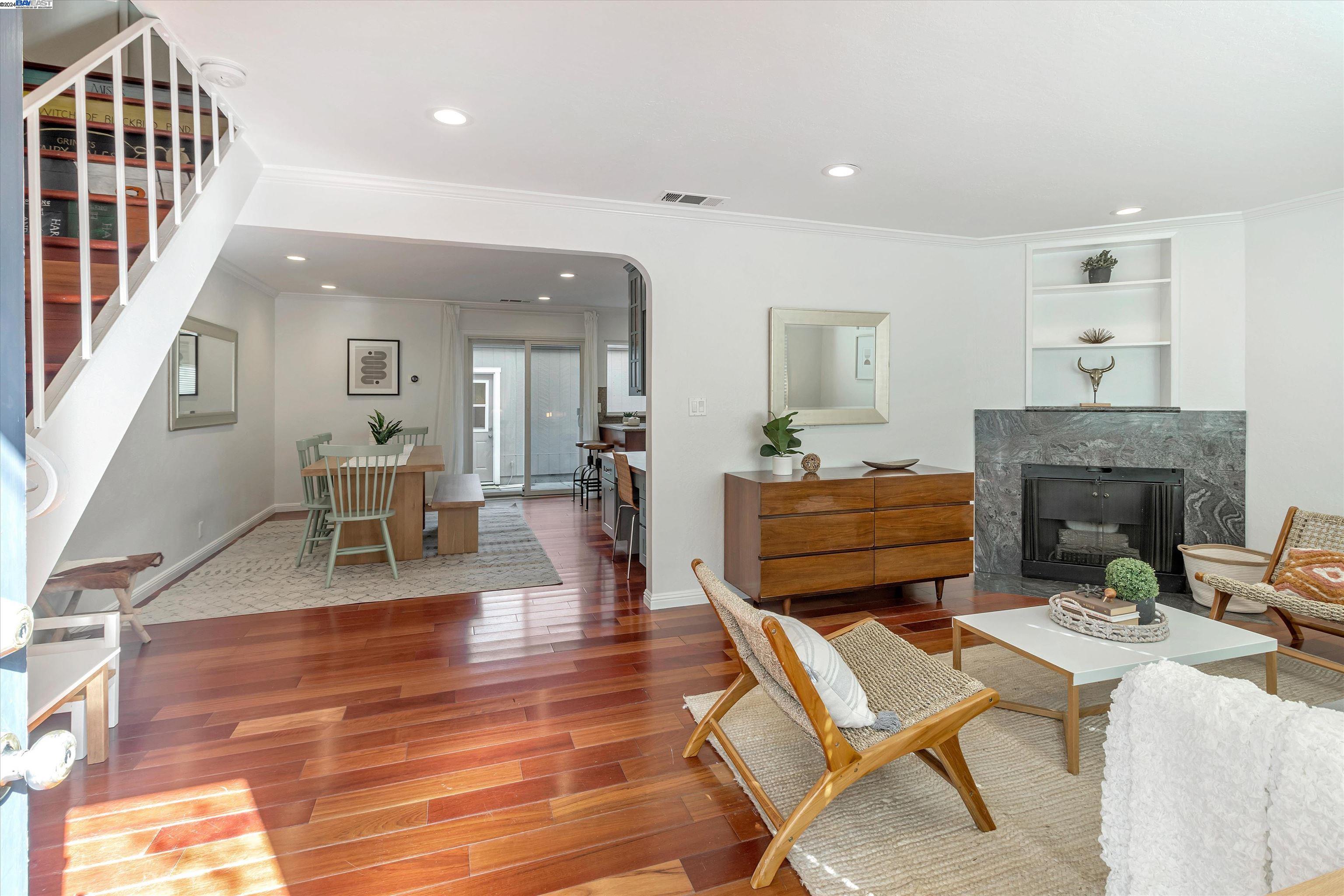 386 Anchor Way Alameda, CA 94501 - Photo 1 of 1 a living room with furniture and a fireplace