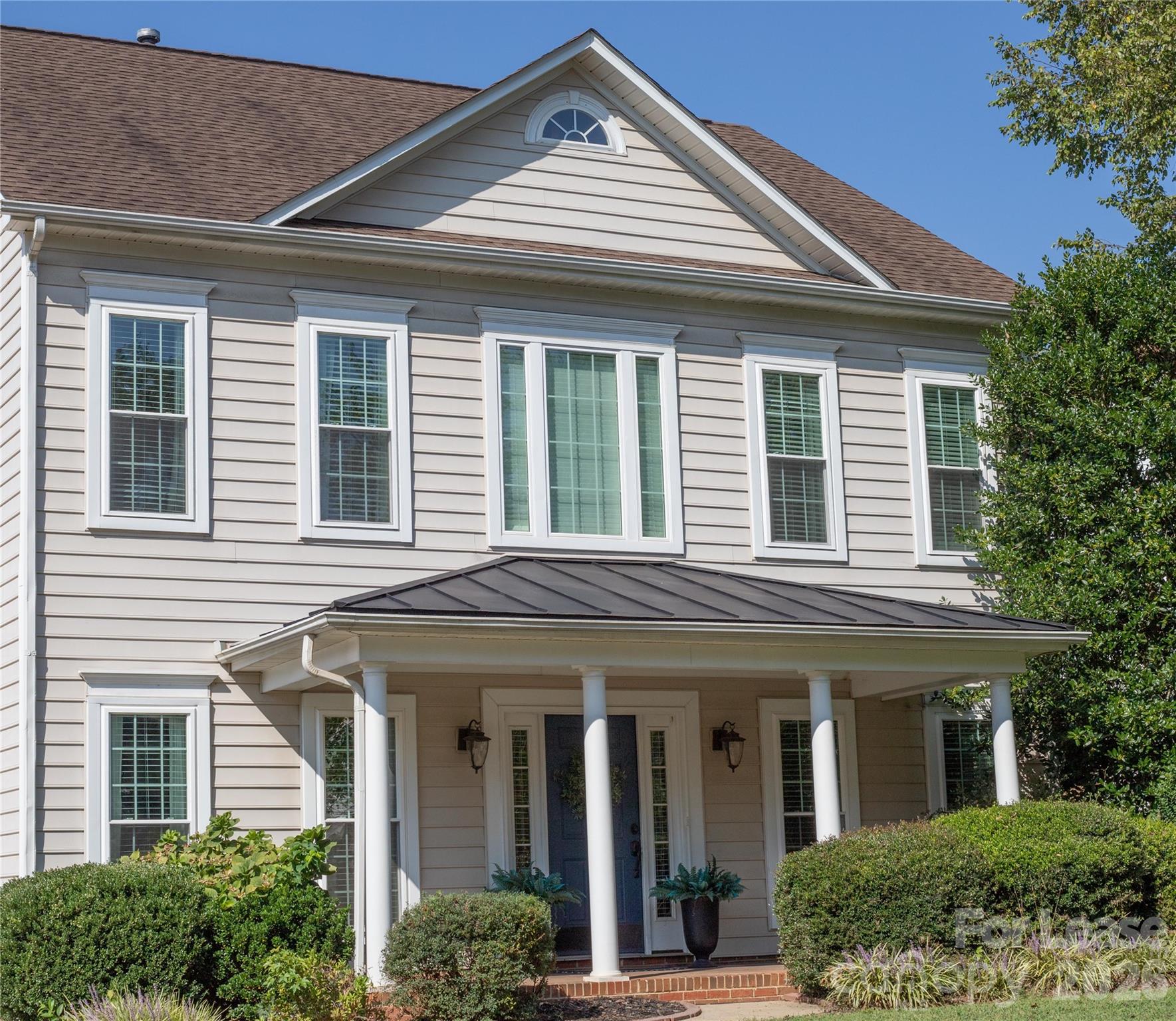615 Circle Trace Road Monroe, NC 28110 - Photo 13 of 16 a front view of a house with a porch