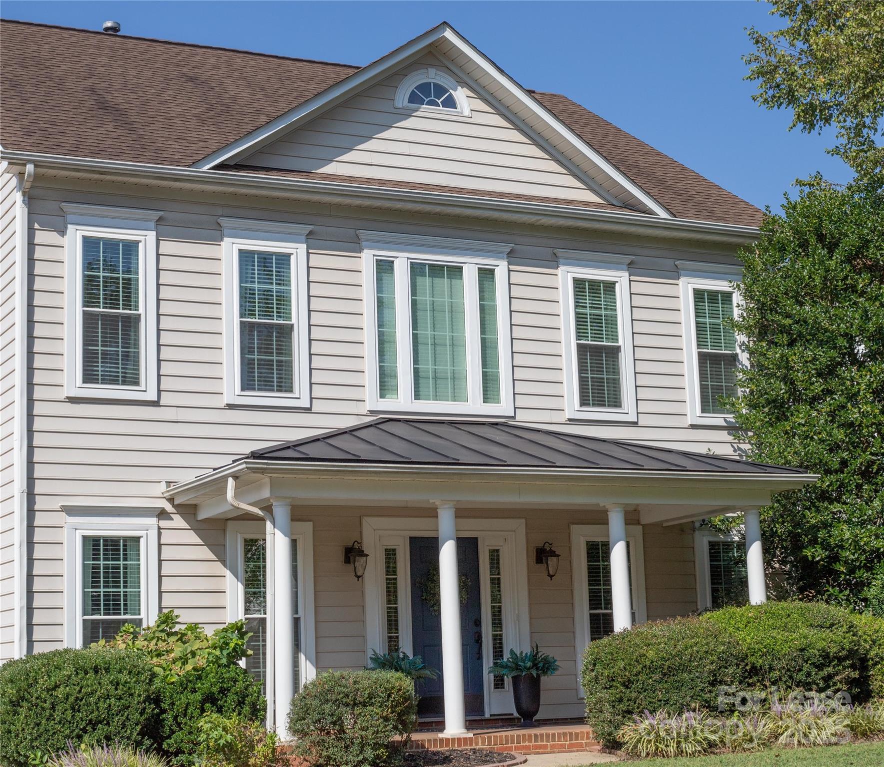 615 Circle Trace Road Monroe, NC 28110 - Photo 13 of 16 a front view of a house with a yard