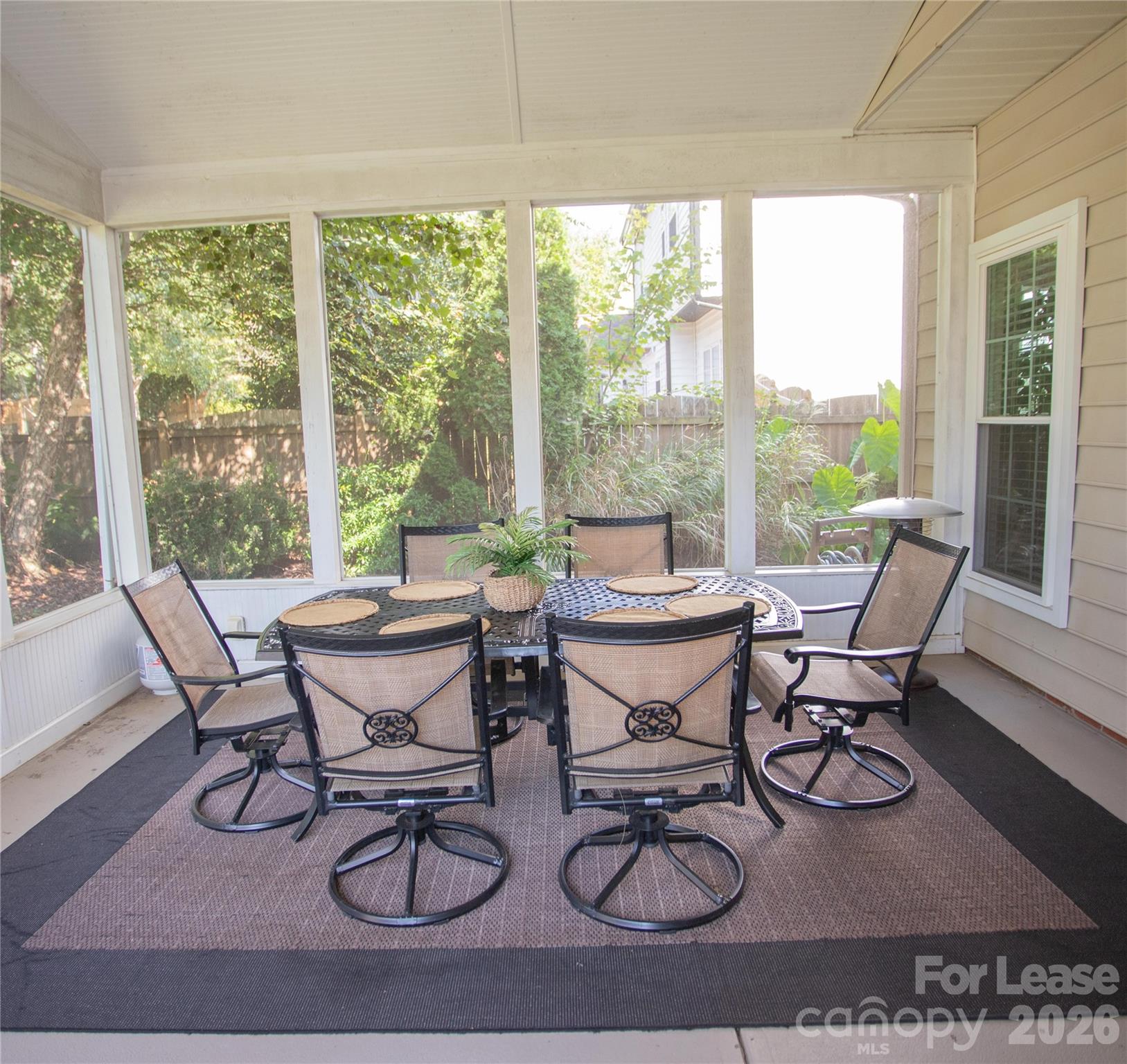 615 Circle Trace Road Monroe, NC 28110 - Photo 14 of 16 a dining room with furniture water view and wooden floor