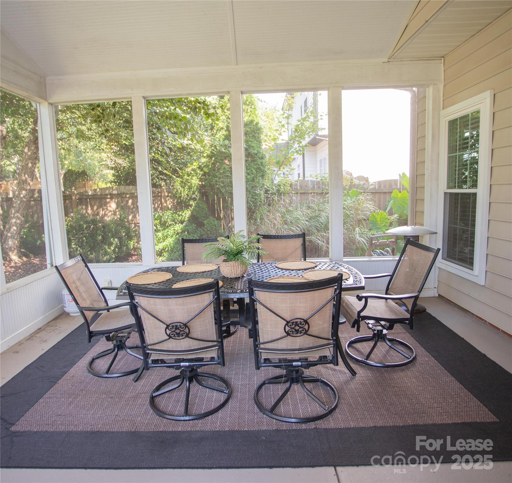 615 Circle Trace Road Monroe, NC 28110 - Photo 14 of 16 a dining room with furniture water view and wooden floor