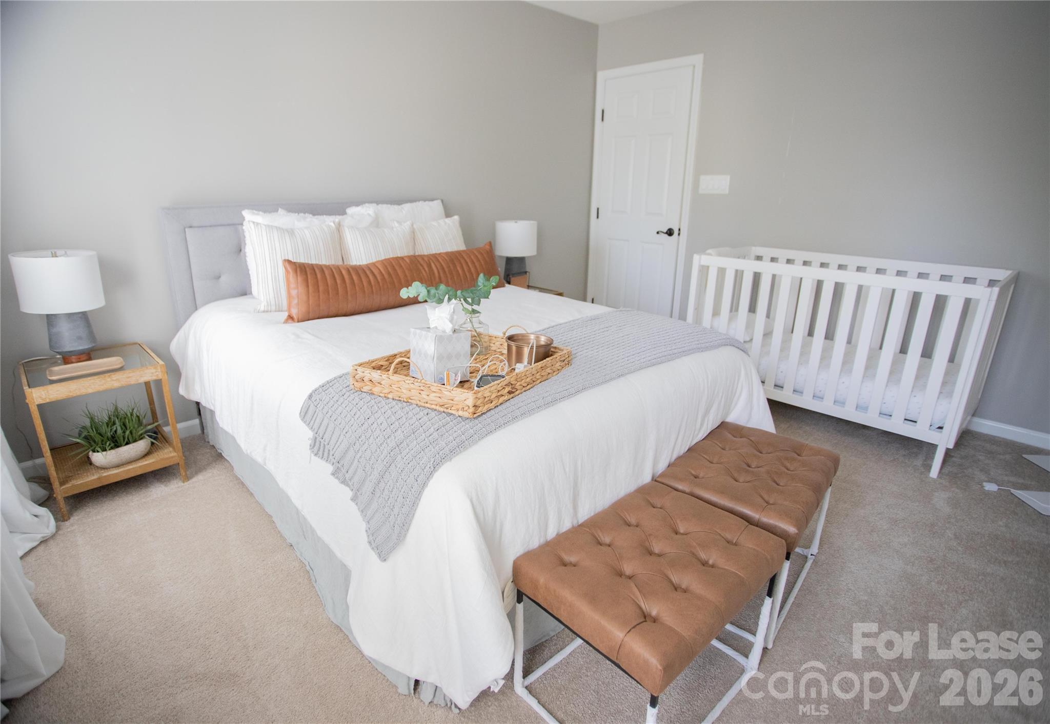 615 Circle Trace Road Monroe, NC 28110 - Photo 9 of 16 a bedroom with a bed and wooden floor