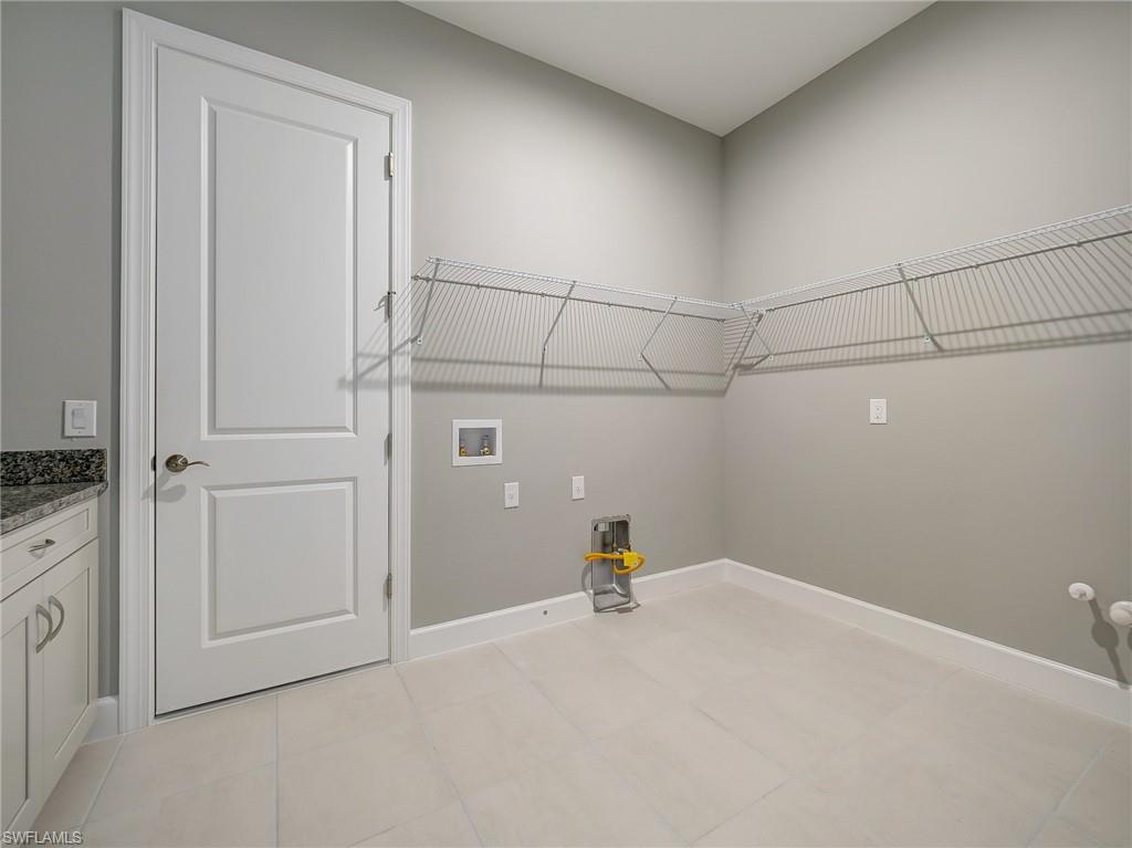 15107 Pescara Street Naples, FL 34114 - Photo 30 of 31 a view of a storage & utility room