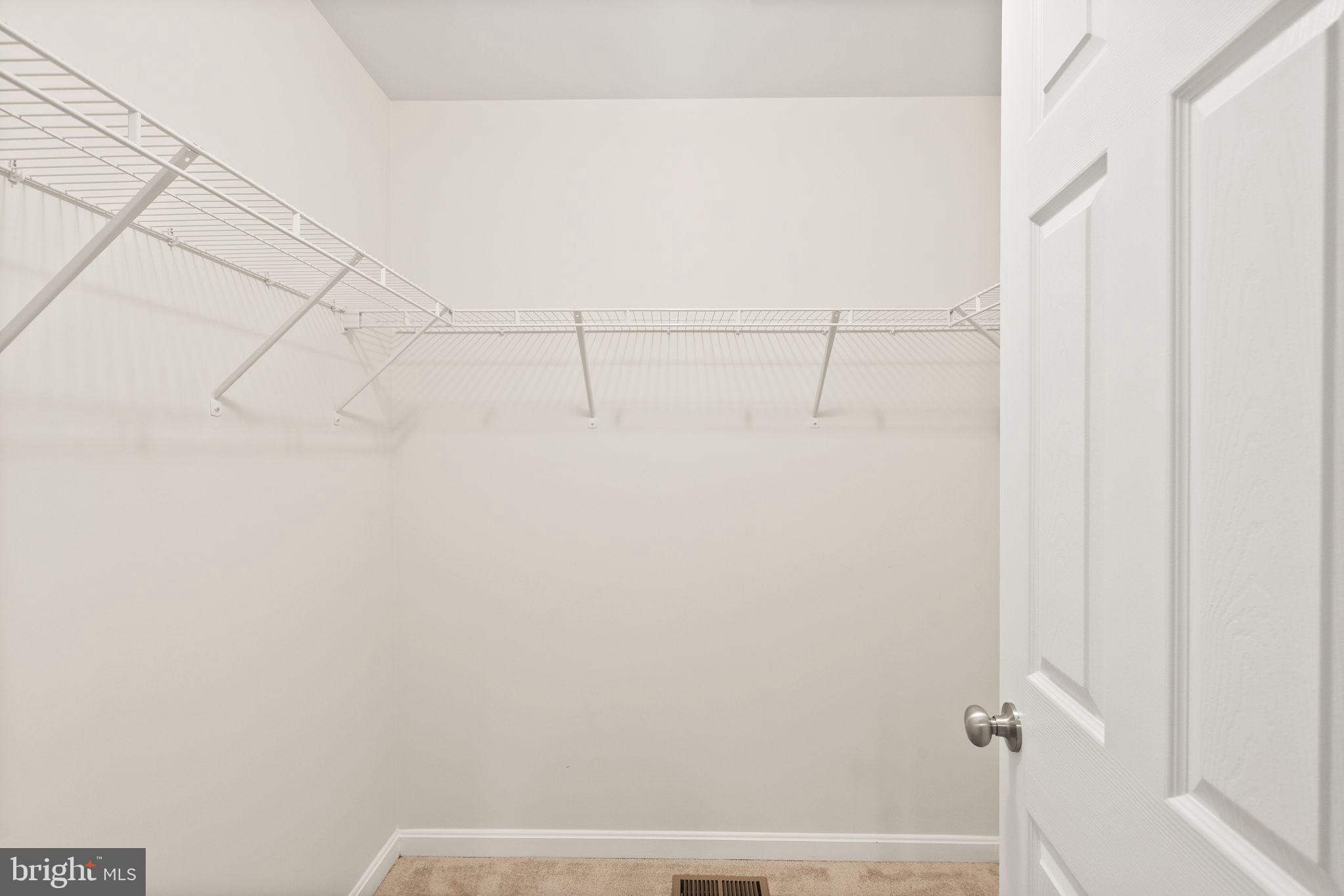 7722 Yalta Way Gainesville, VA 20155 - Photo 39 of 75 a view of small space with racks on the wall