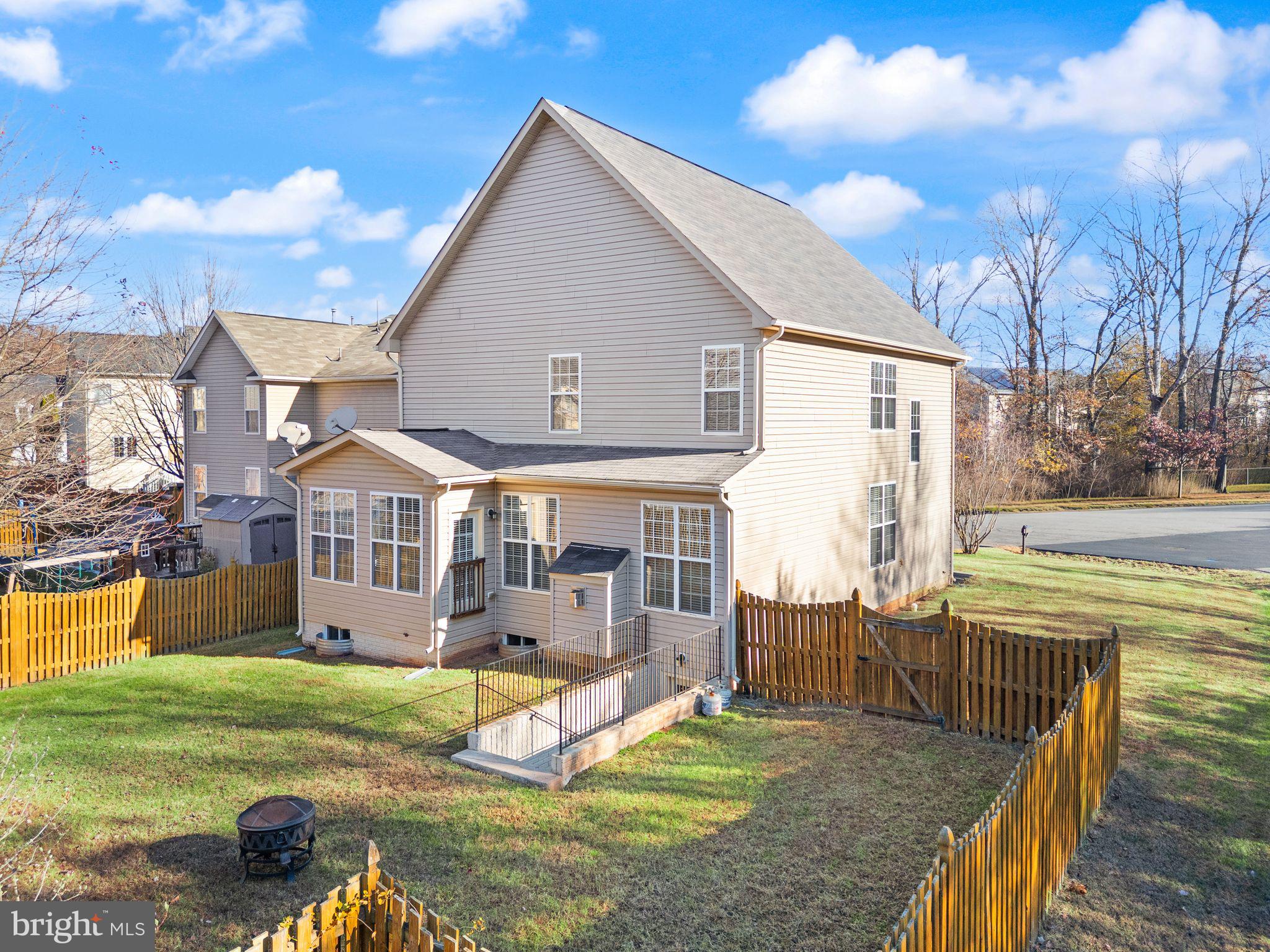 7722 Yalta Way Gainesville, VA 20155 - Photo 70 of 75 a view of a house with a yard