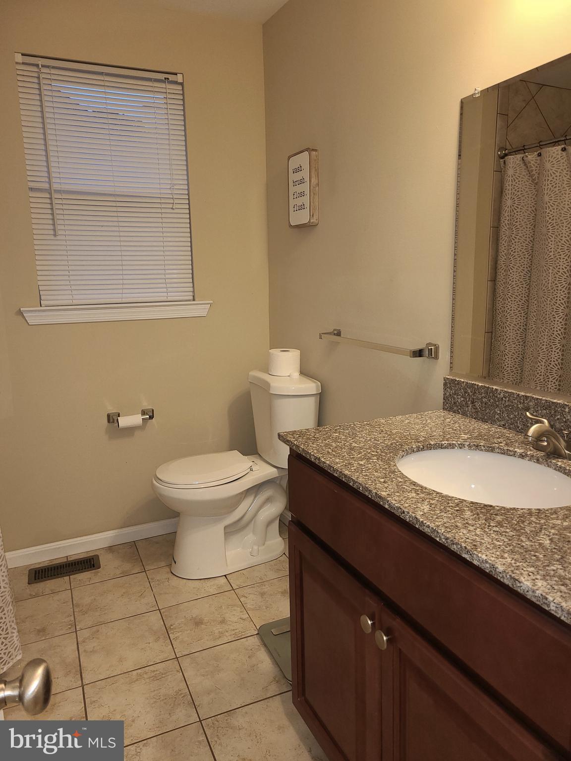 4217 Thorncliff Road Baltimore, MD 21236 - Photo 14 of 35 1st floor full bath - ceramic floor