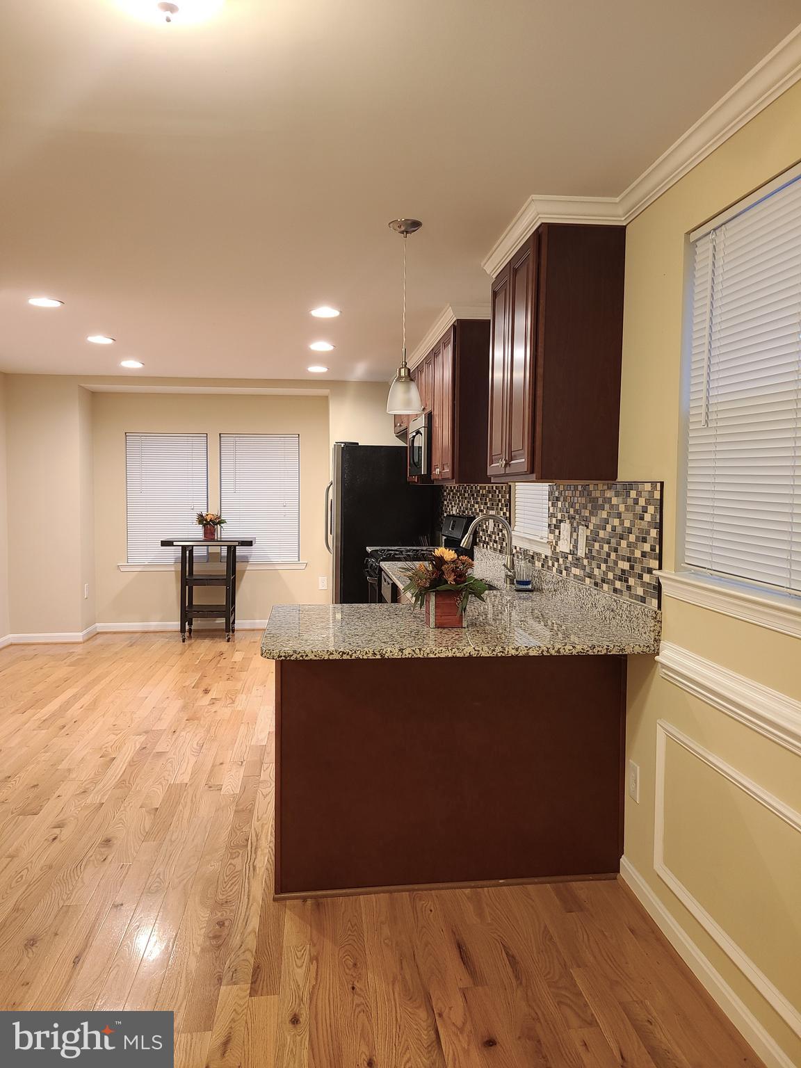 4217 Thorncliff Road Baltimore, MD 21236 - Photo 6 of 35 Kitchen - wood floors