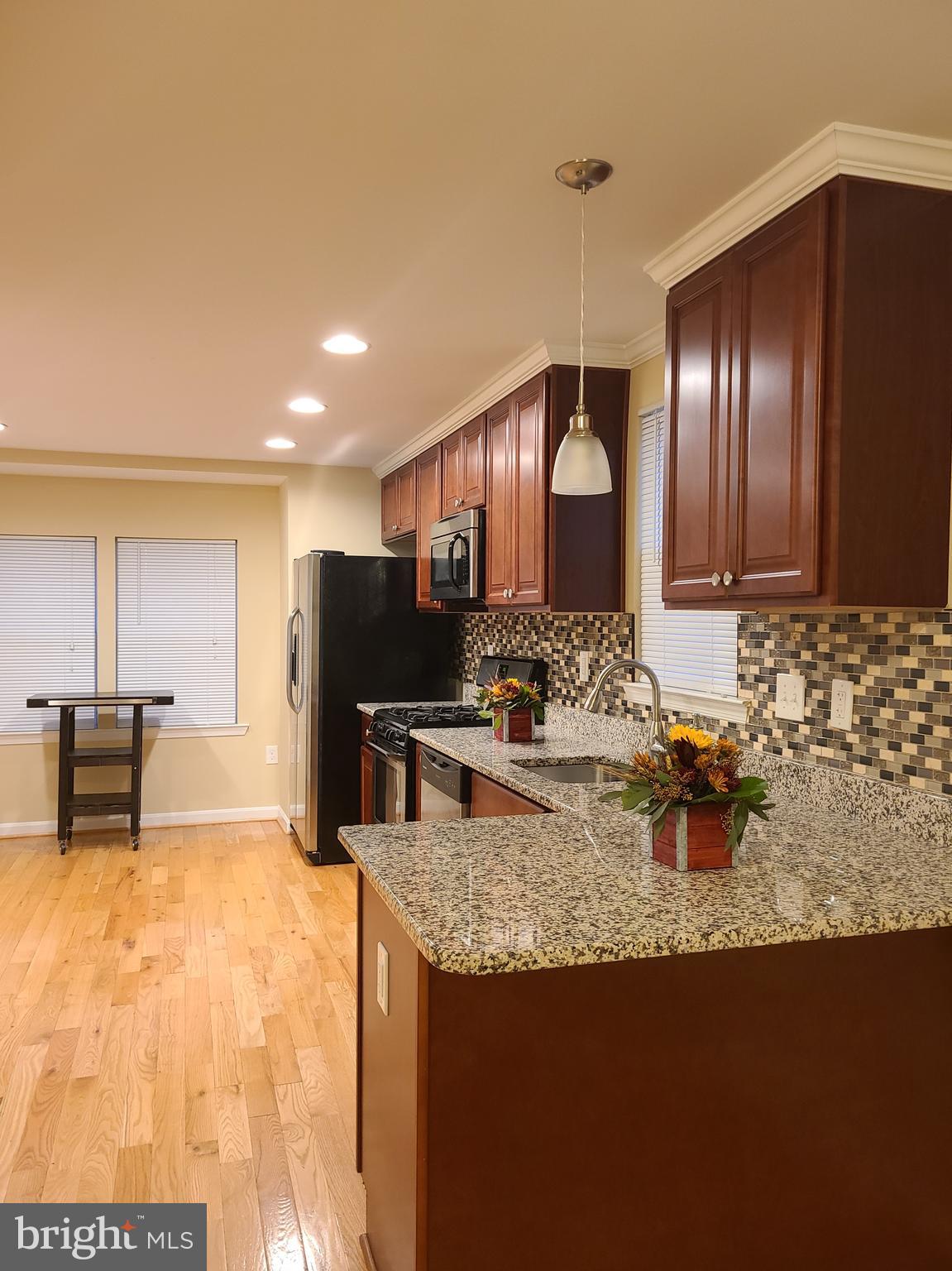 4217 Thorncliff Road Baltimore, MD 21236 - Photo 7 of 35 Kitchen w/cherry cabinets & SS appliances