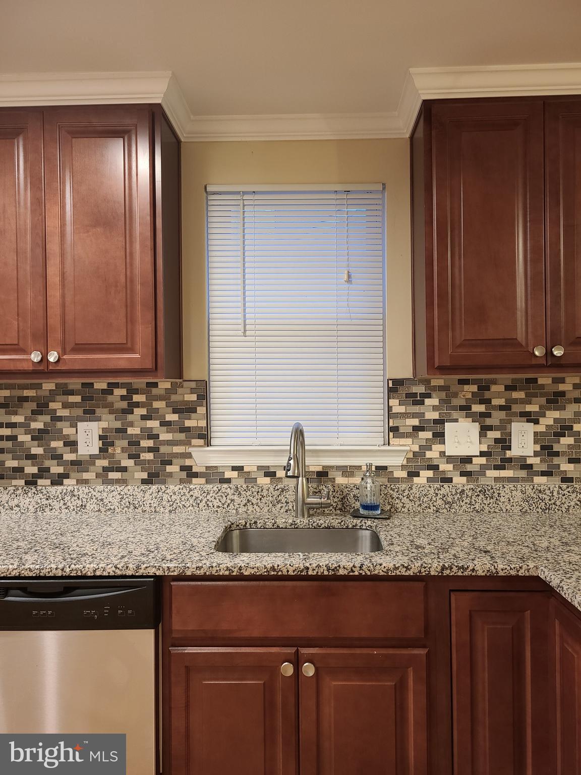 4217 Thorncliff Road Baltimore, MD 21236 - Photo 9 of 35 Kitchen with glass tile backsplash