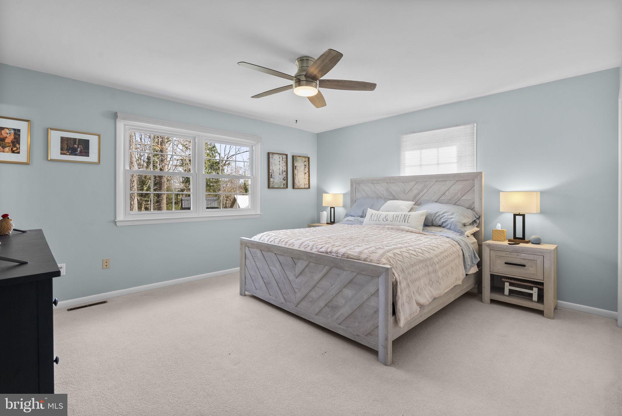 712 Petersburg Road Davidsonville, MD 21035 - Photo 16 of 37 a bedroom with a bed and window