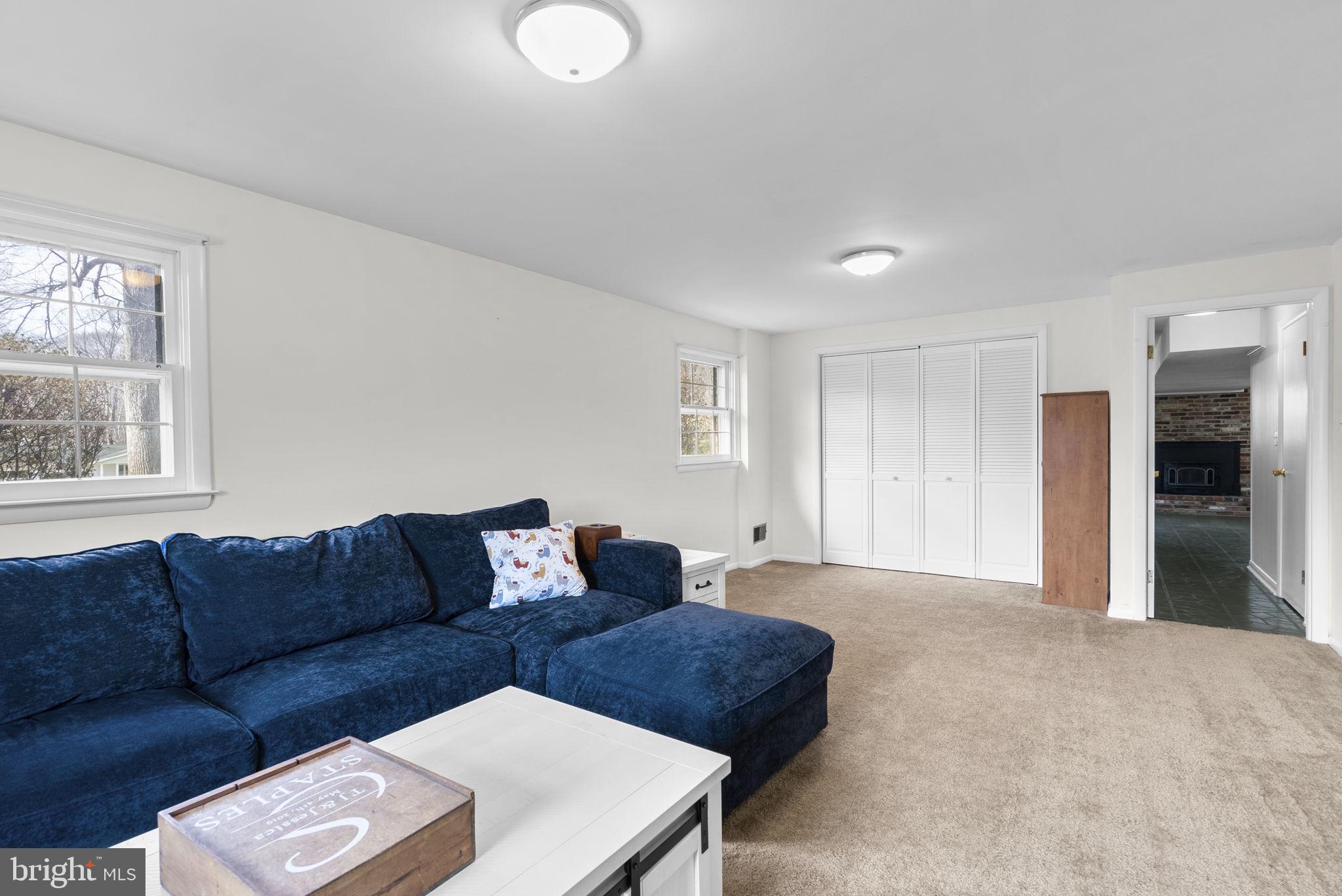 712 Petersburg Road Davidsonville, MD 21035 - Photo 26 of 37 a living room with furniture and a window