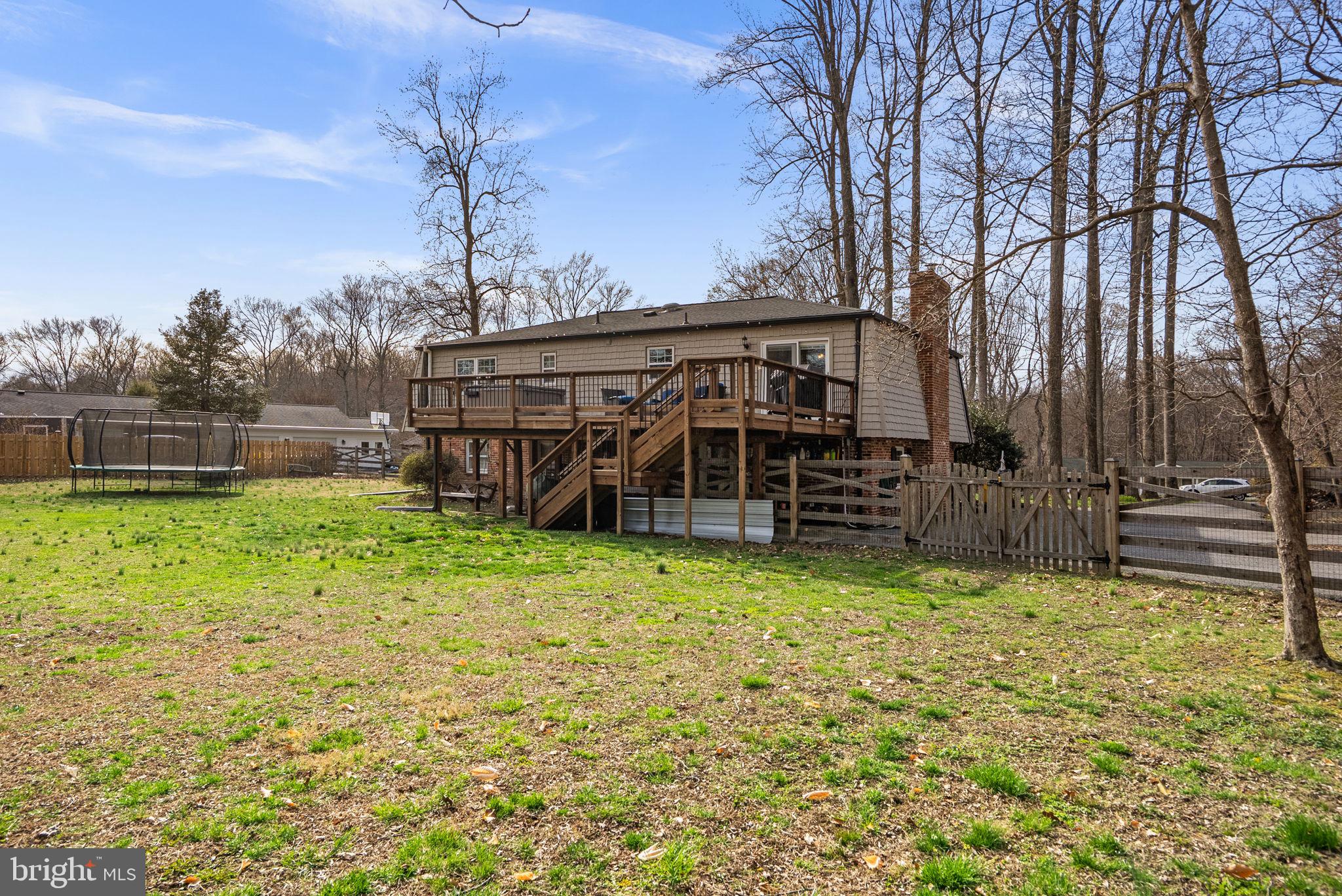 712 Petersburg Road Davidsonville, MD 21035 - Photo 30 of 37 a view of a house with a yard and sitting area