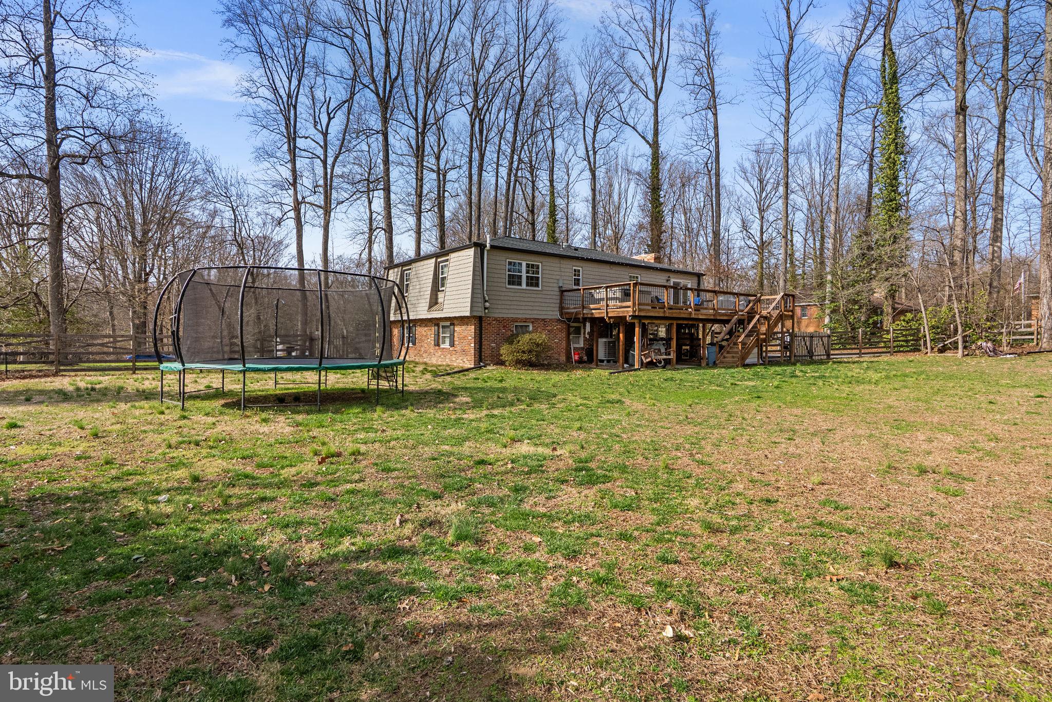 712 Petersburg Road Davidsonville, MD 21035 - Photo 33 of 37 a view of a yard with large trees